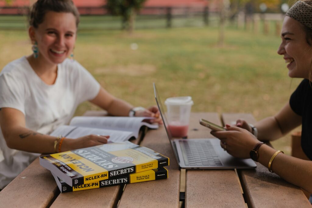 man in white crew neck t-shirt reading book